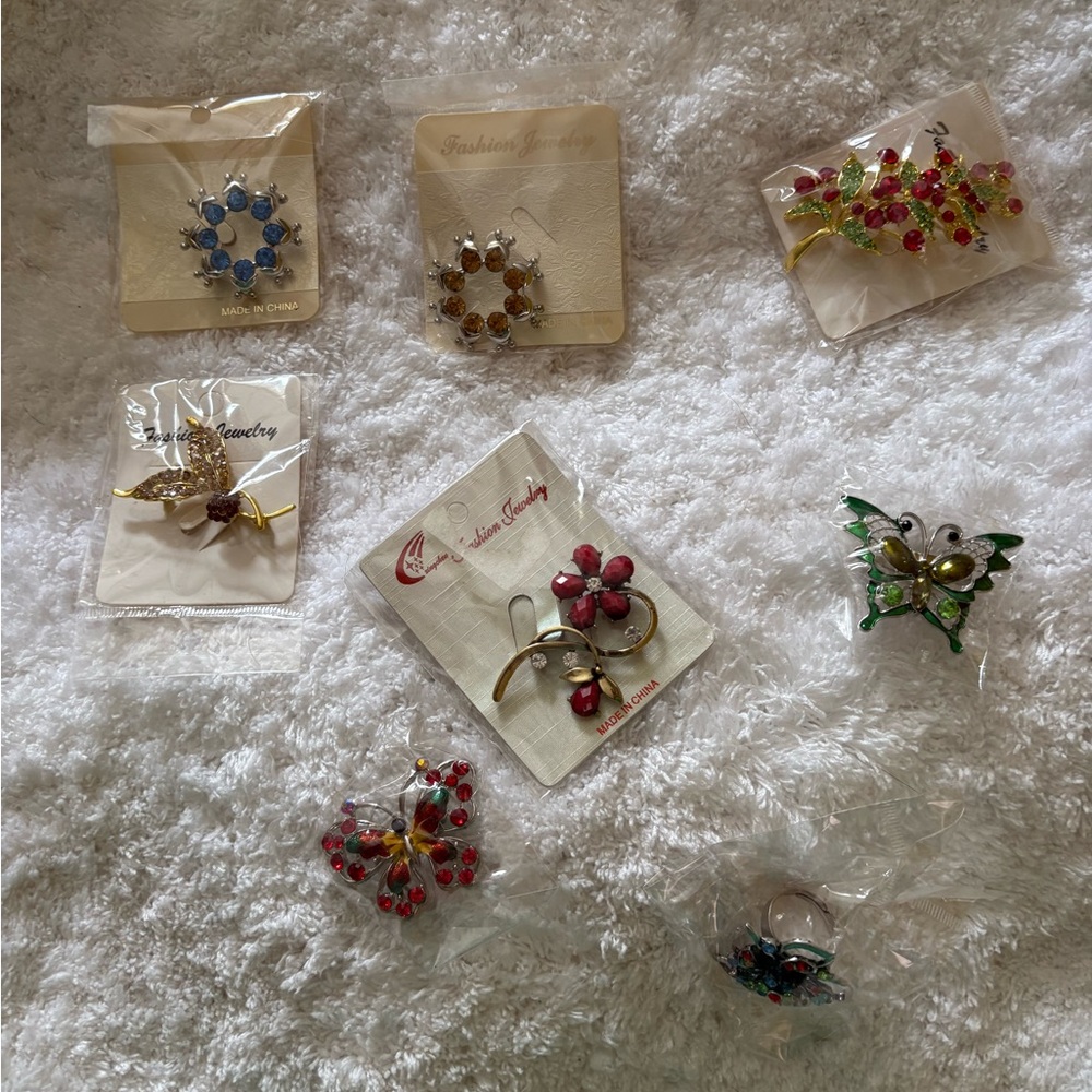 Elegant Floral Brooch Set and 1 ring.  Costume jewelry